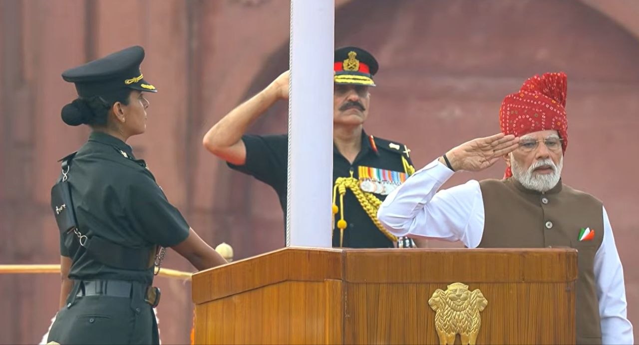 PM Modi and military officers saluting after flag hoisting at Red Fort