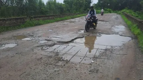 Crumbling road to Nepal poses safety crisis for thousands of daily commuters