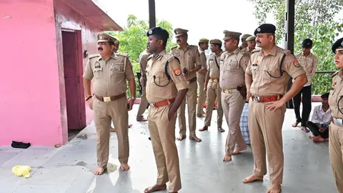 Police Inspect Security at Banda's Bamdeveshwar Temple for Shravan Monday Crowds