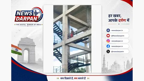 Youth climbs water tank with flag demanding road construction in Shravasti