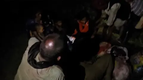 Tempo plunges into pit after hitting stray bull on highway, locals rescue passengers
