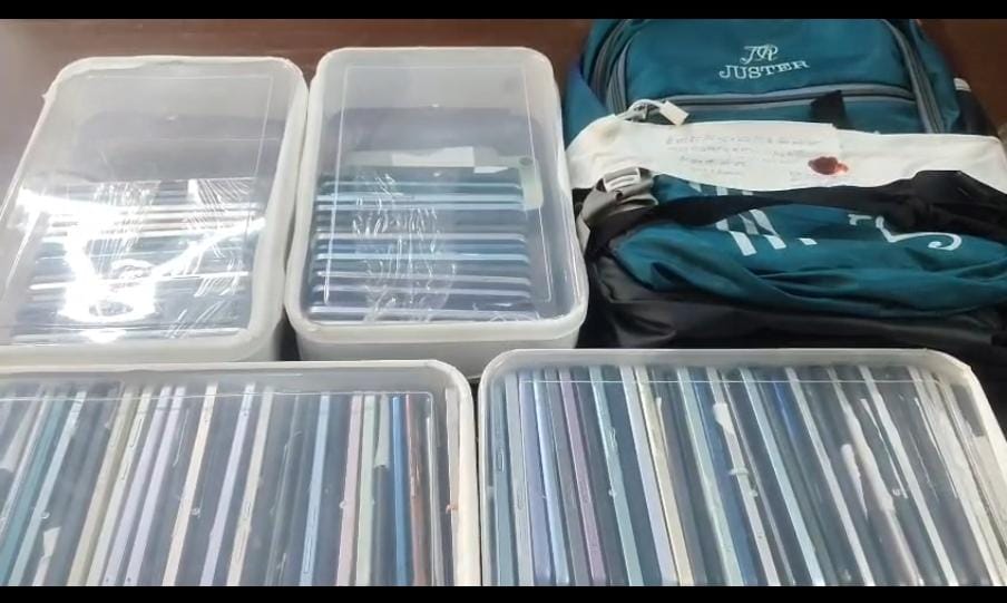 Mobile phones recovered by GRP Ghaziabad displayed in containers