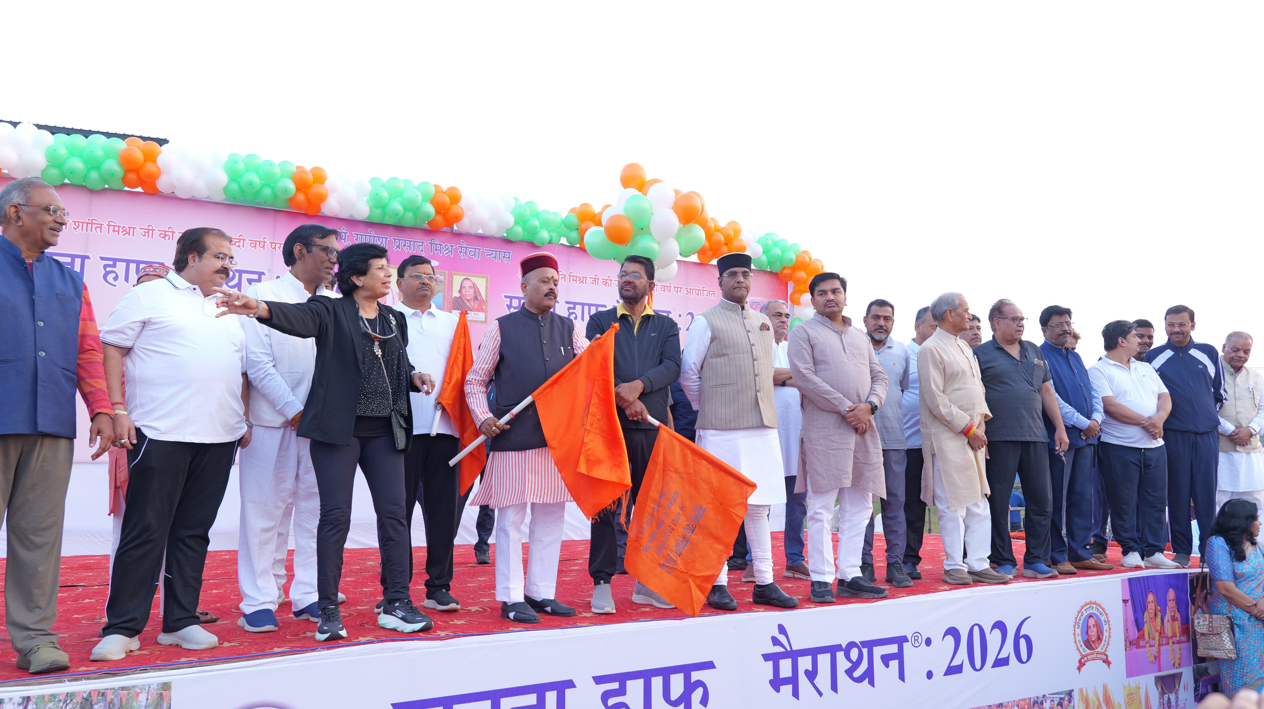 Satna Half Marathon 2026 flag-off ceremony with guests holding saffron flags