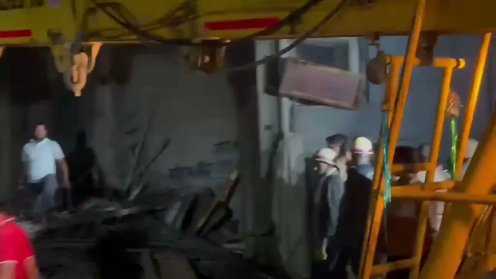 Debris and crane at the under-construction building where the lenter collapsed near Shaheed Nagar metro station, Sahibabad