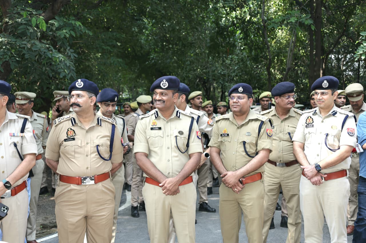 Senior police officers gathered outdoors during the Ghaziabad programme