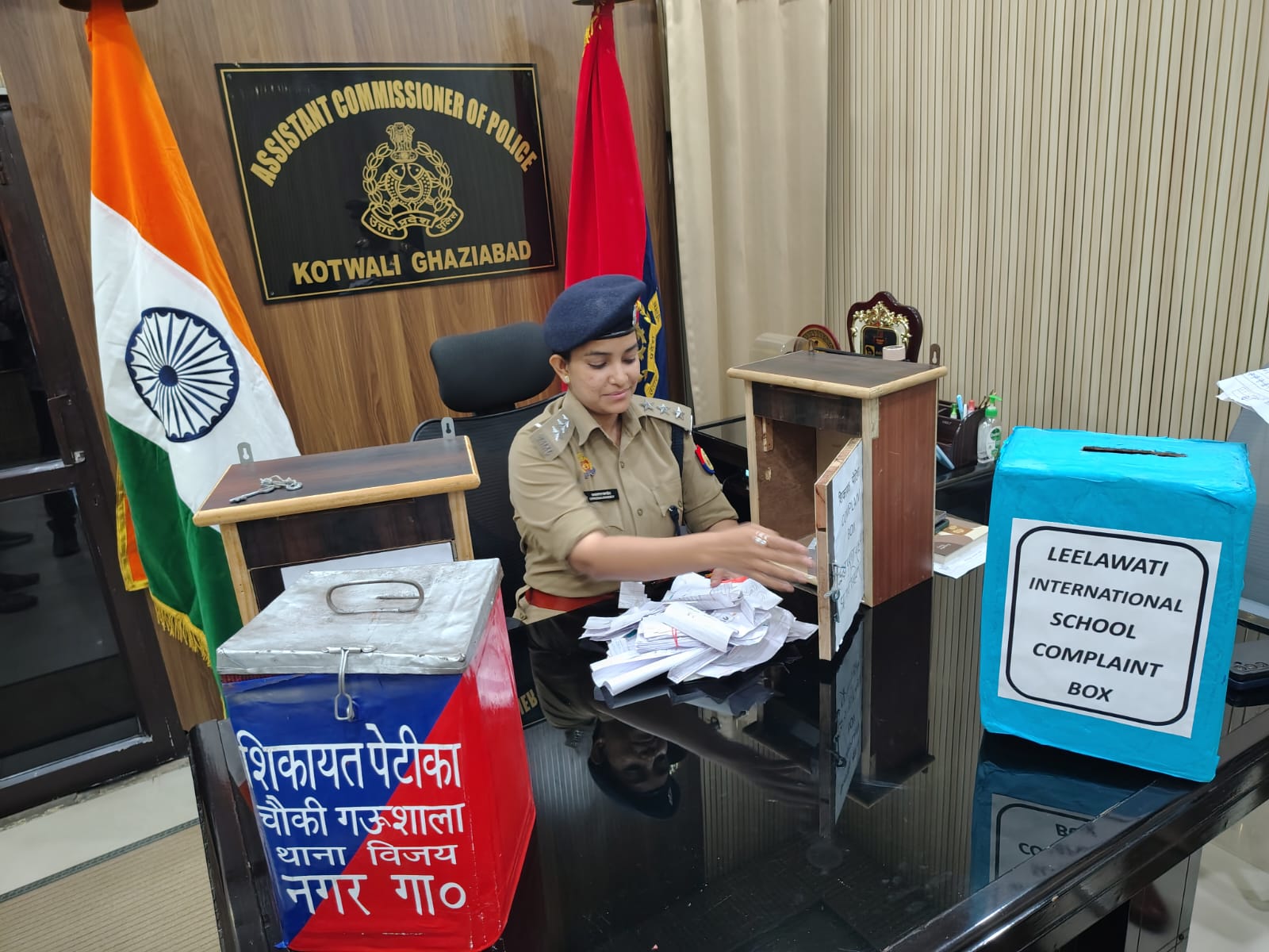 ACP Upasana Pandey reviews slips collected in complaint boxes