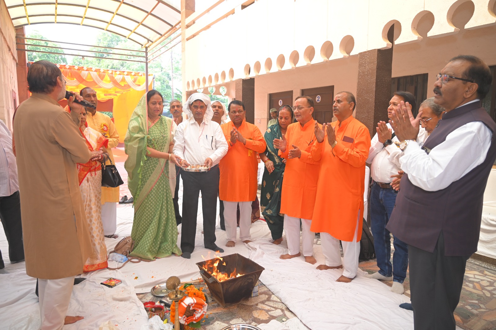 Participants gathered around the havan fire during the ritual