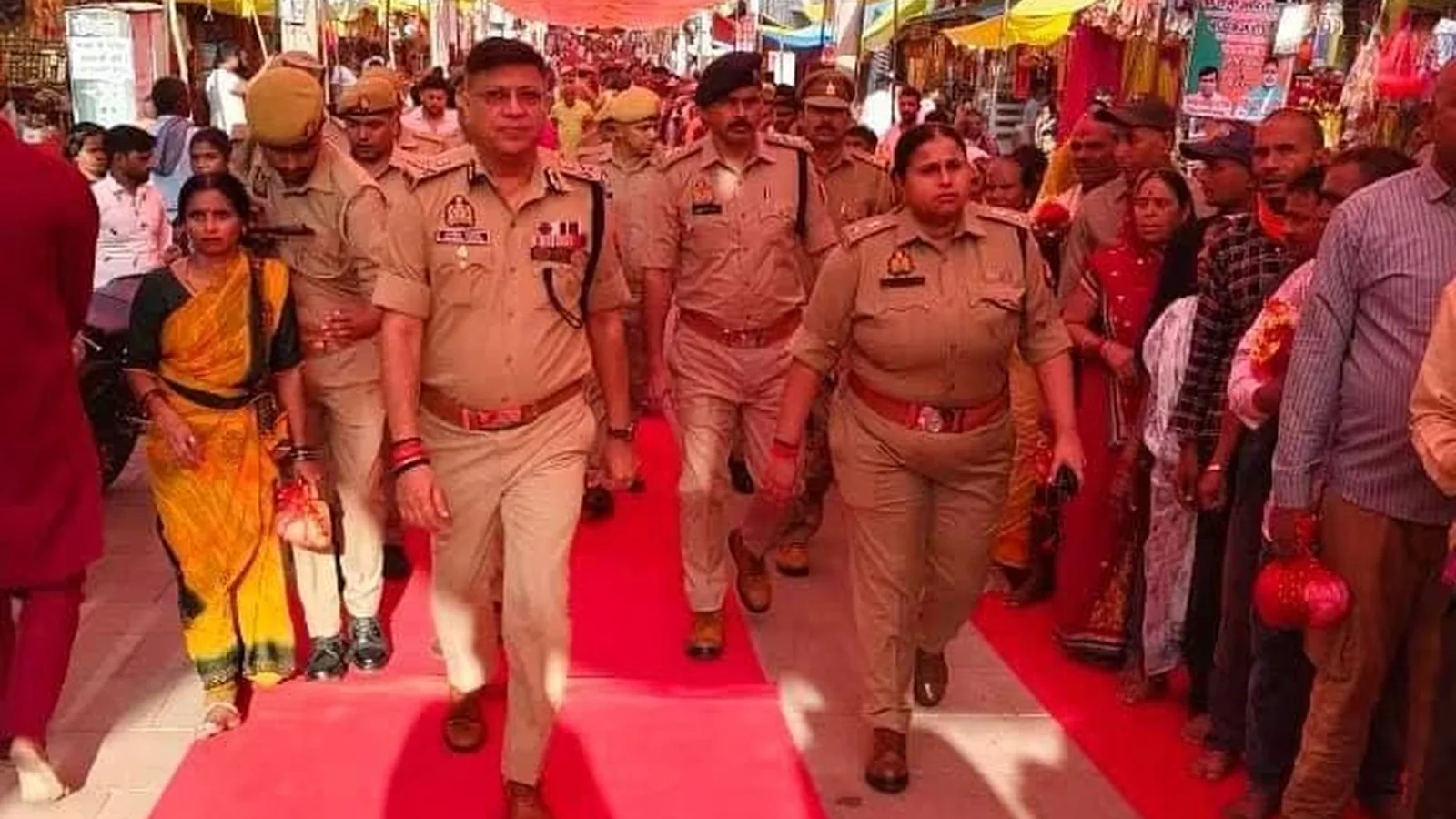 ADG Varanasi Zone Naveen Arora walks through the Vindhyachal Dham fair during a security inspection