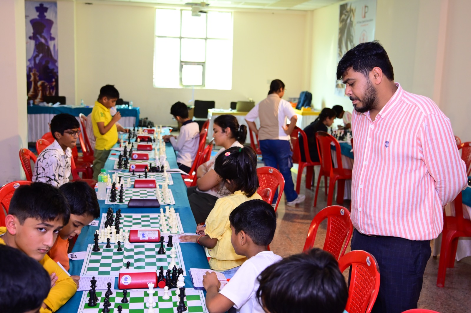 A young player makes a move during the tournament.