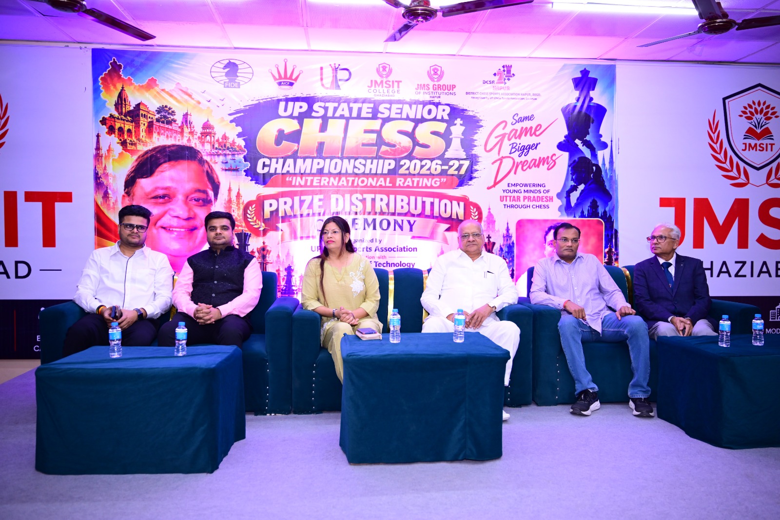 Stage before a backdrop reading “Prize Distribution Ceremony”.