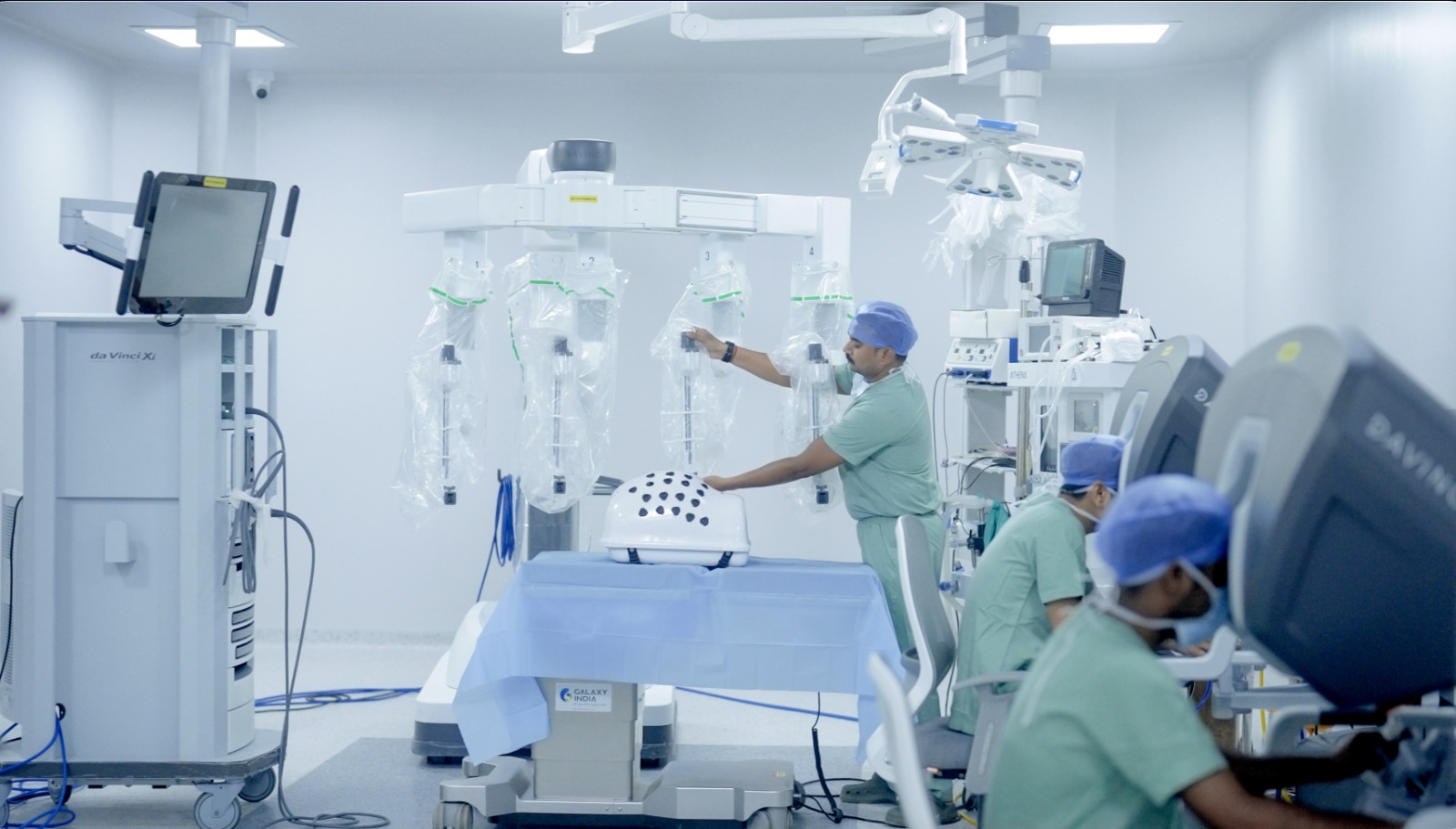 Medical team with a robotic surgery system